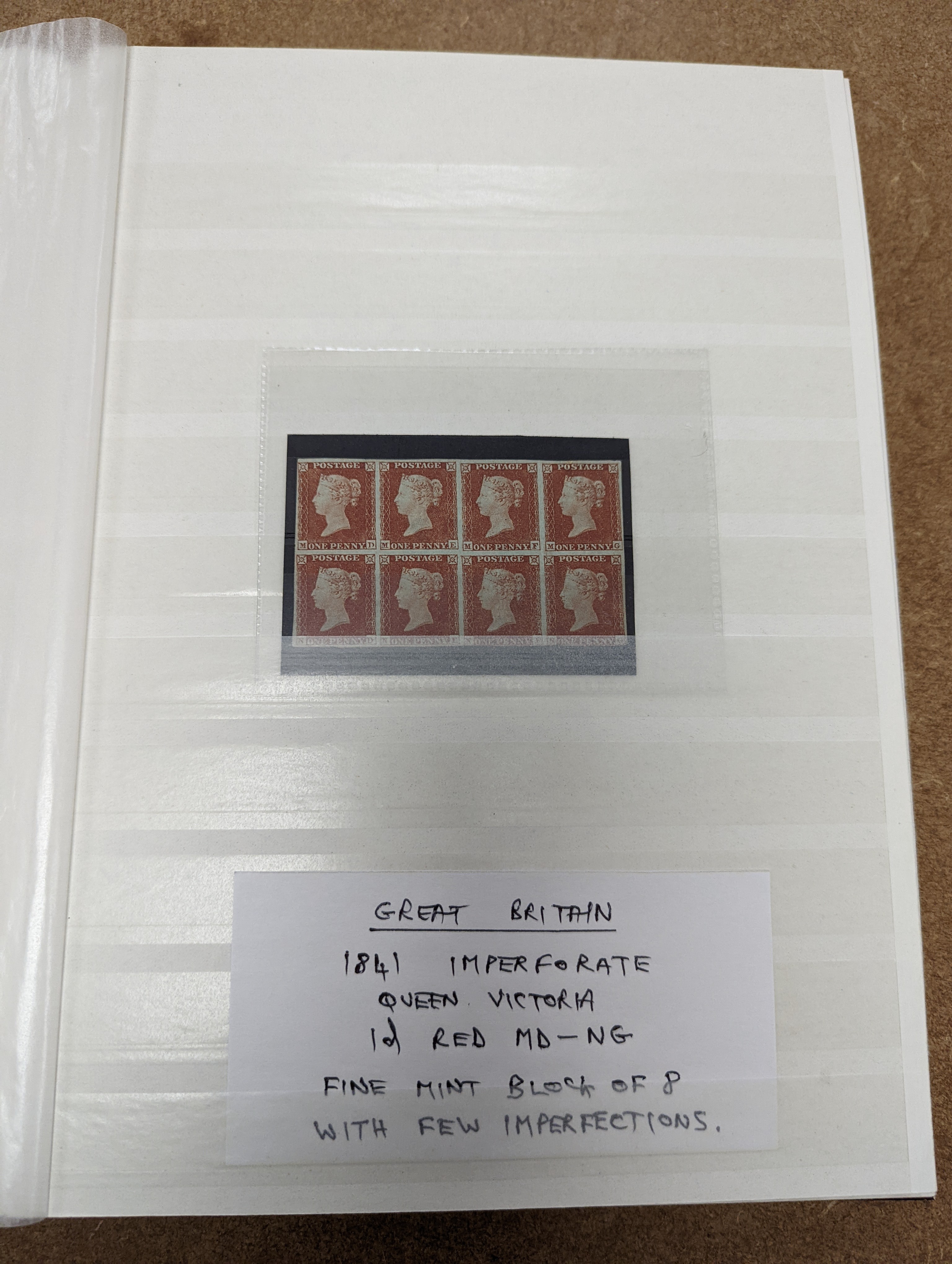 Great Britain stamps in stock book with 1840 1d black and 1841 2d blue unused. 1841 1d red brown mint block of 8, 1864-79 1d red plates in mint blocks including plate 79 block of 48, plate 170 block of 6 with marginal in